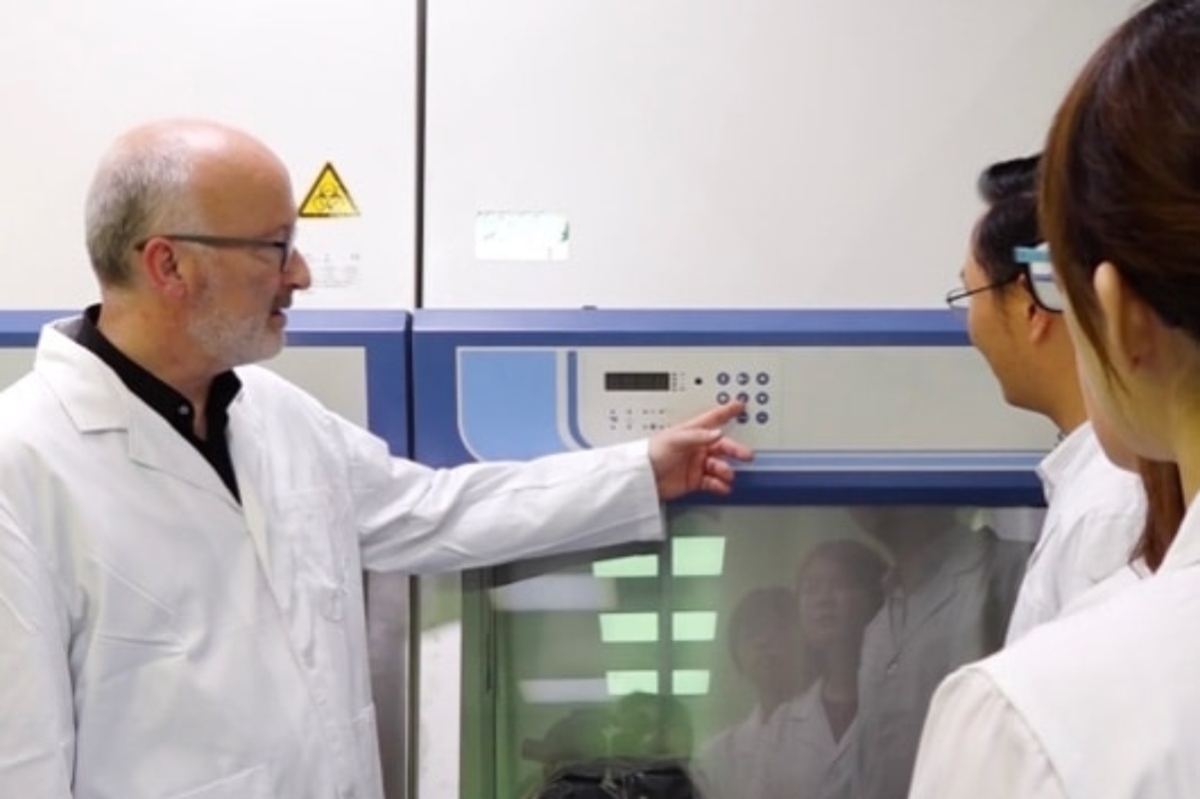 Frank pressing button